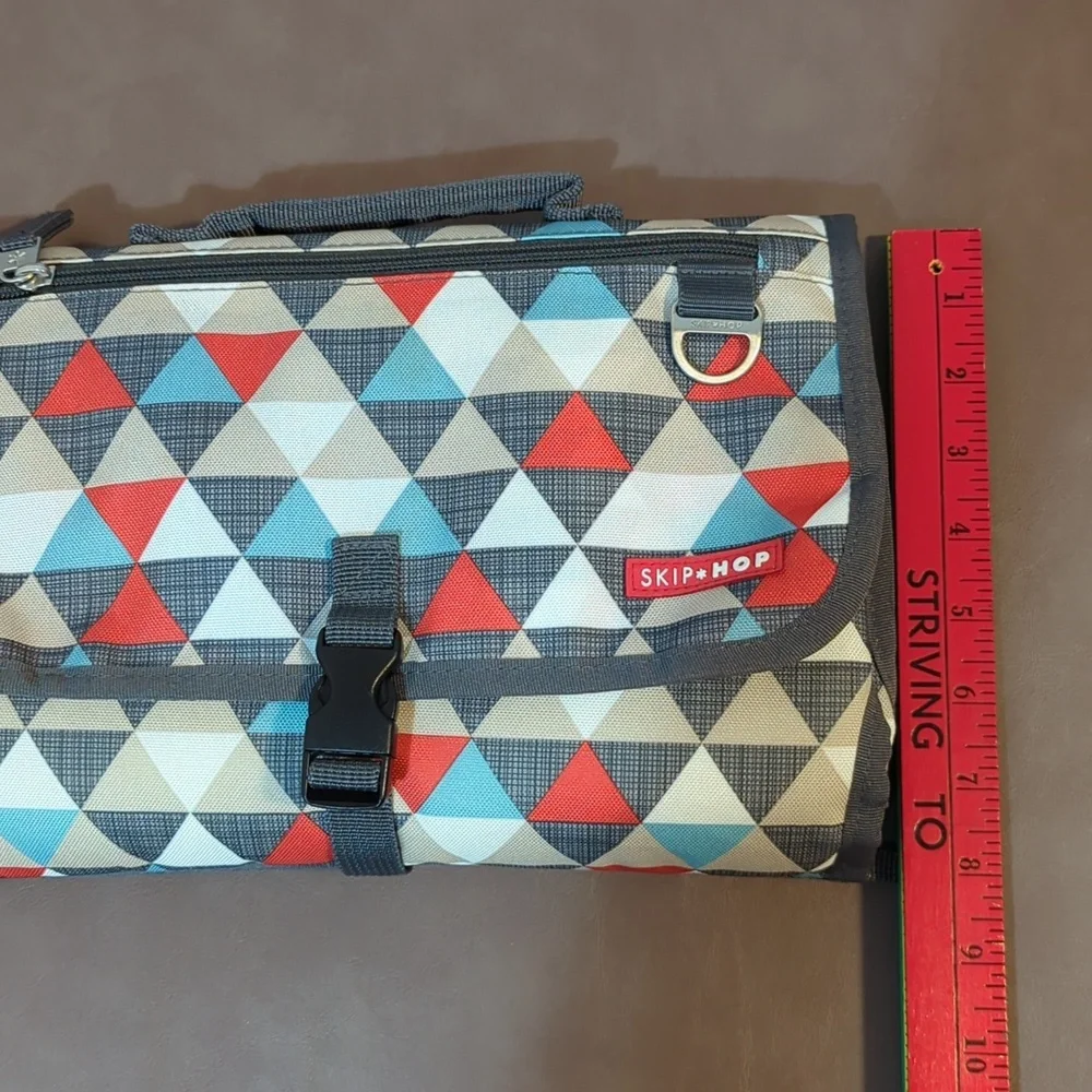 Skip Hop Pronto Baby Changing Station Portable Wristlet Triangle pattern